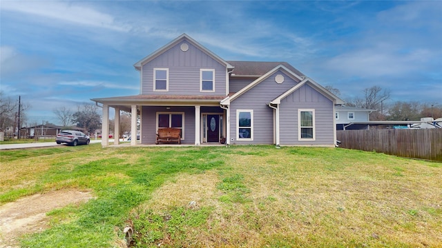 view of front of property featuring a porch and a front yard