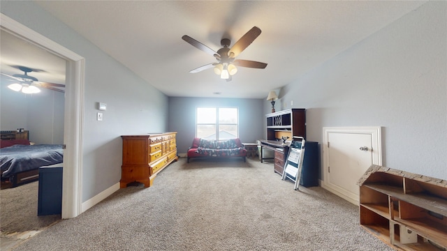 rec room with carpet floors and ceiling fan