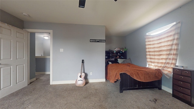 bedroom with light colored carpet