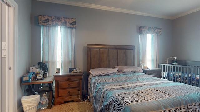 bedroom featuring crown molding