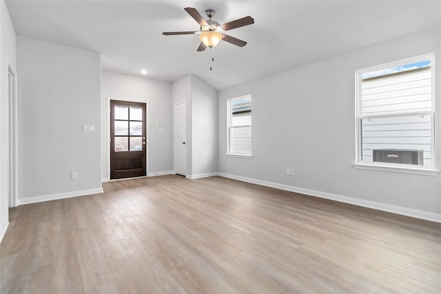 interior space featuring ceiling fan and light wood-type flooring