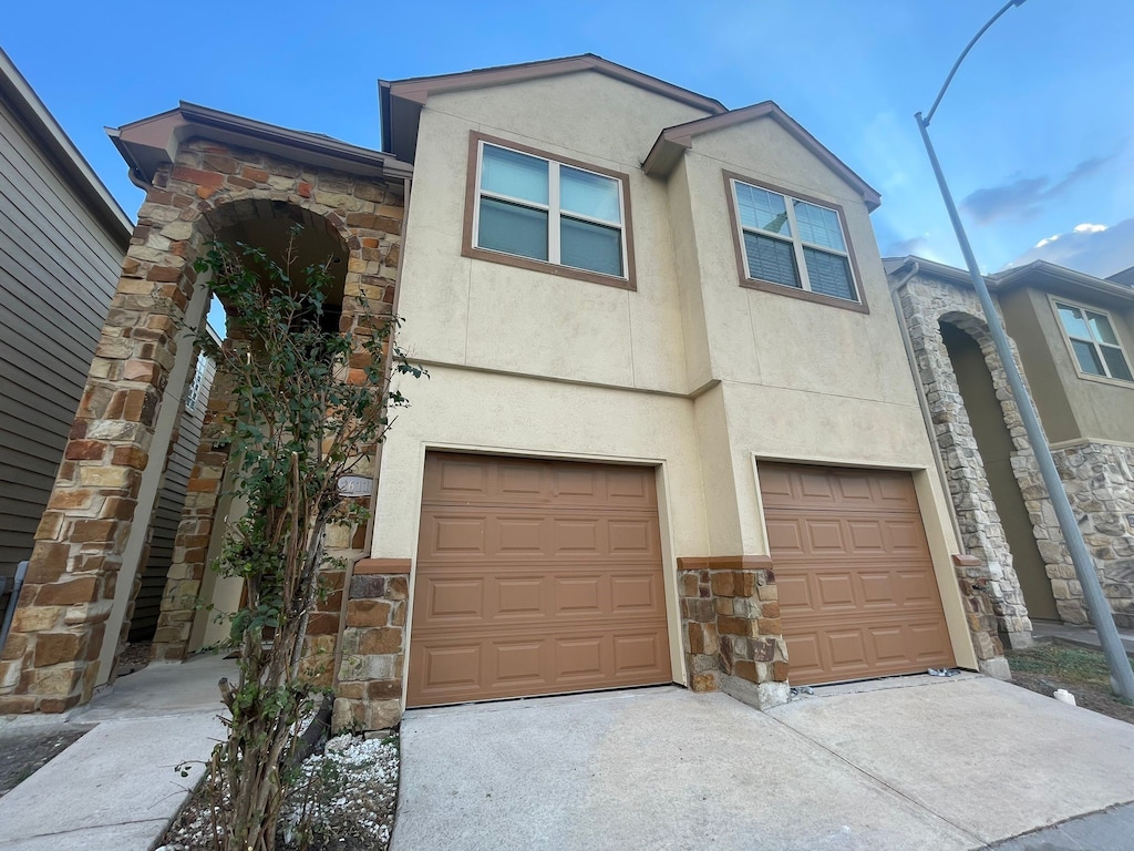 view of front of home featuring a garage