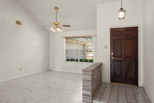 foyer featuring vaulted ceiling and ceiling fan