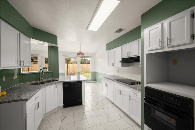 kitchen with stone countertops, decorative light fixtures, sink, white cabinets, and black appliances