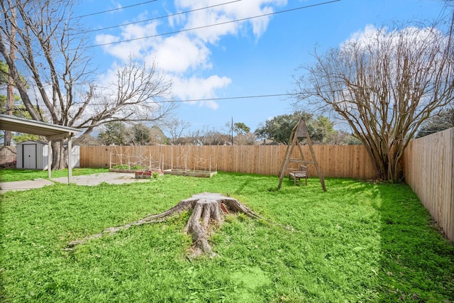 view of yard with a patio and a shed