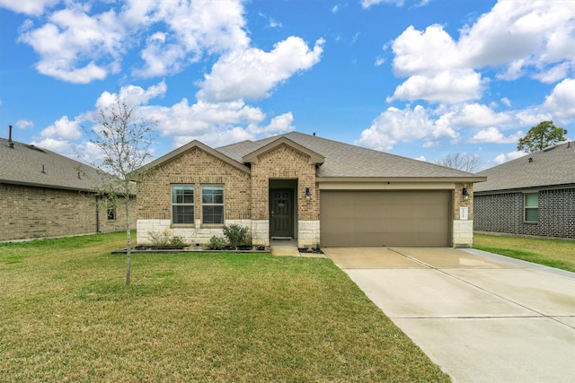 ranch-style home with a garage and a front lawn