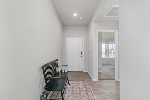 hallway featuring light hardwood / wood-style floors