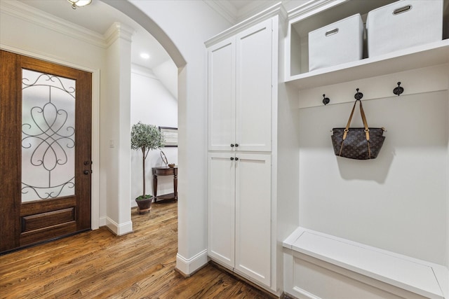 mudroom featuring hardwood / wood-style flooring and ornamental molding