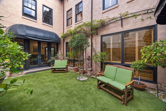 exterior space with french doors and an outdoor living space