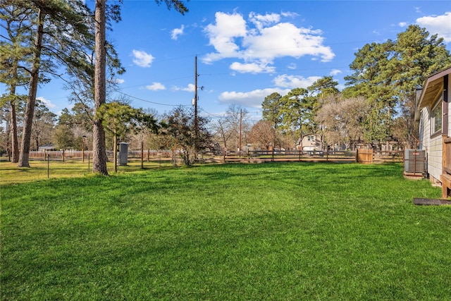 view of yard with fence