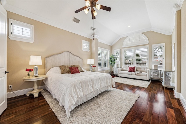 bedroom with lofted ceiling, ornamental molding, and dark hardwood / wood-style floors