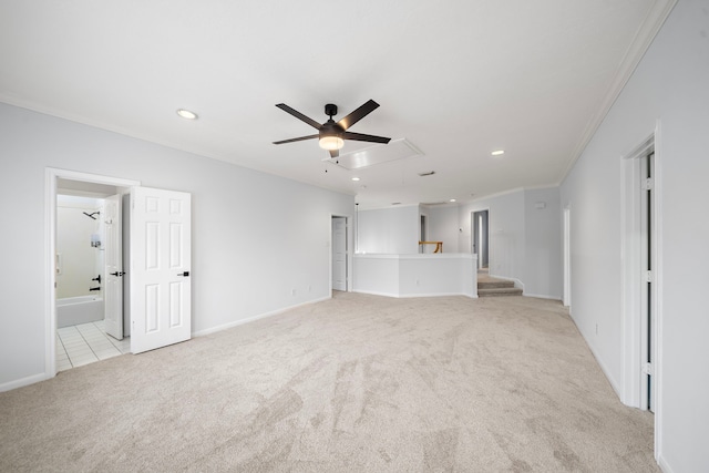 unfurnished living room with ornamental molding, light colored carpet, and ceiling fan