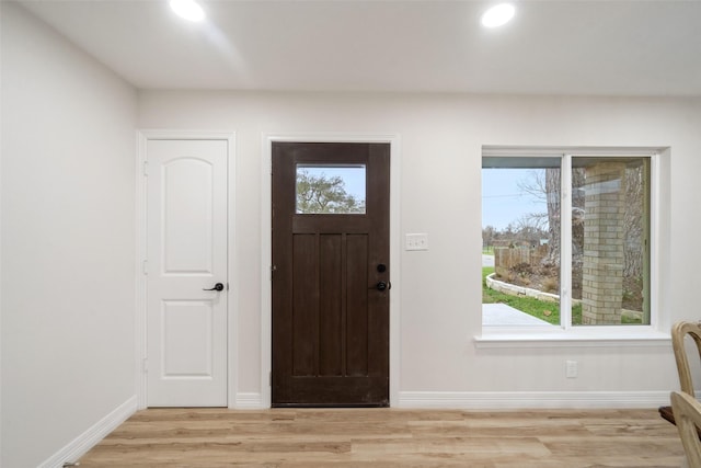 foyer entrance featuring light hardwood / wood-style flooring
