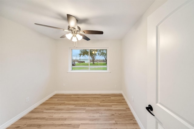 empty room with light hardwood / wood-style flooring and ceiling fan