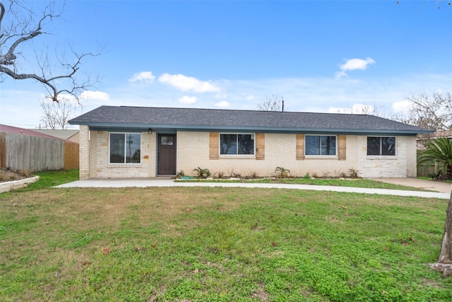 single story home featuring a patio area and a front lawn