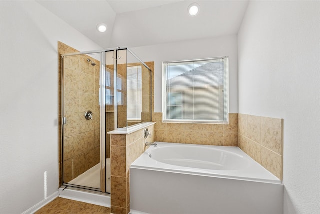 bathroom featuring plus walk in shower