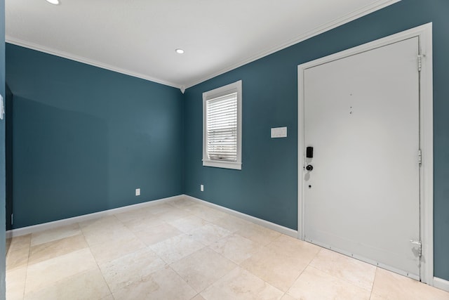 empty room featuring ornamental molding, recessed lighting, and baseboards