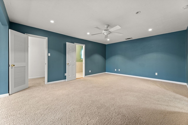 unfurnished room with ceiling fan, recessed lighting, baseboards, and light colored carpet