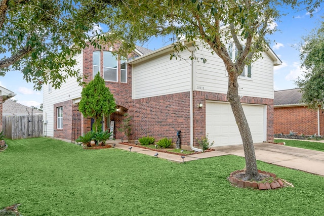 view of front of property with a garage and a front lawn