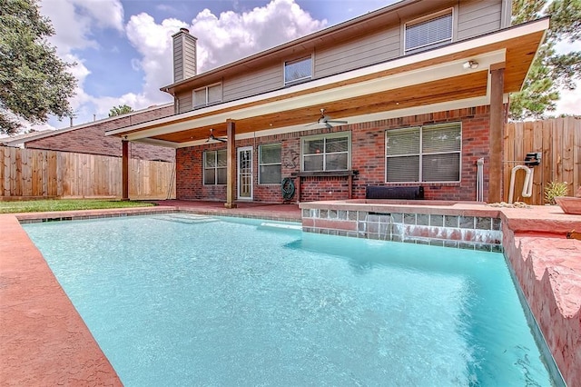 view of pool with ceiling fan