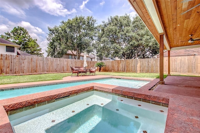 view of swimming pool featuring a patio area, ceiling fan, and an in ground hot tub