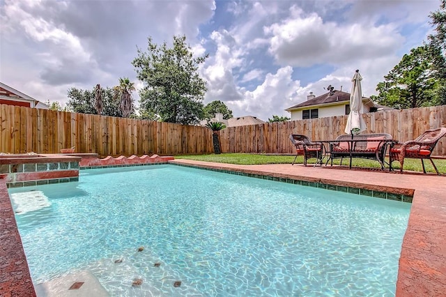 view of pool featuring a patio area