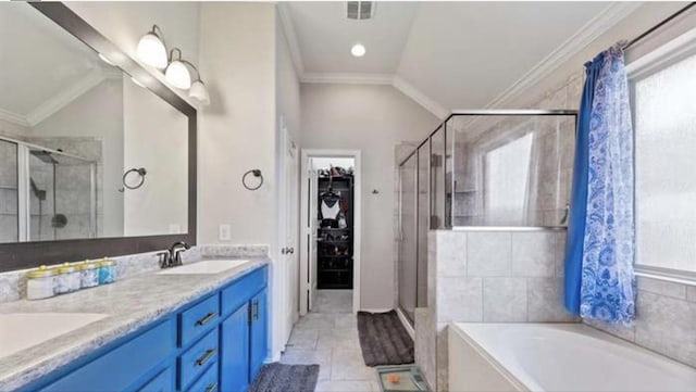 bathroom with vanity, crown molding, and shower with separate bathtub