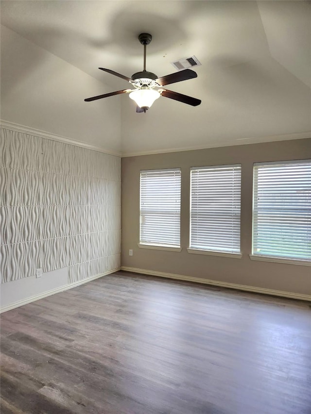 unfurnished room featuring ceiling fan, lofted ceiling, and wood-type flooring