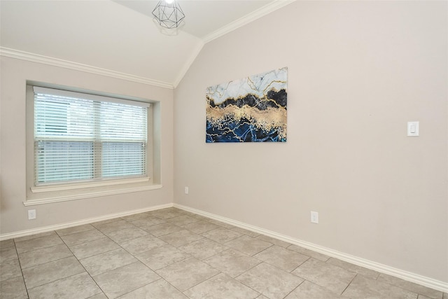 tiled spare room with crown molding and lofted ceiling