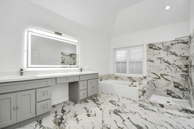 bathroom featuring vanity, lofted ceiling, and plus walk in shower