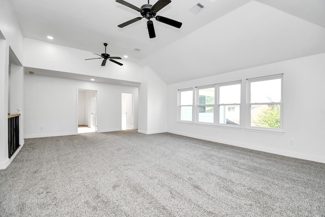 unfurnished living room with lofted ceiling and carpet floors