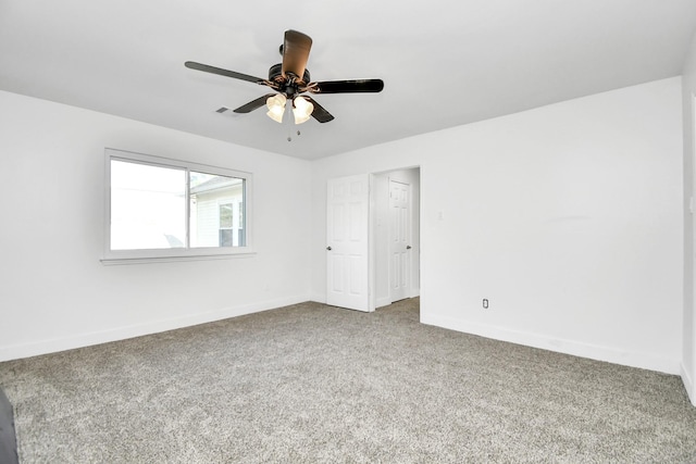 unfurnished room with carpet floors and ceiling fan