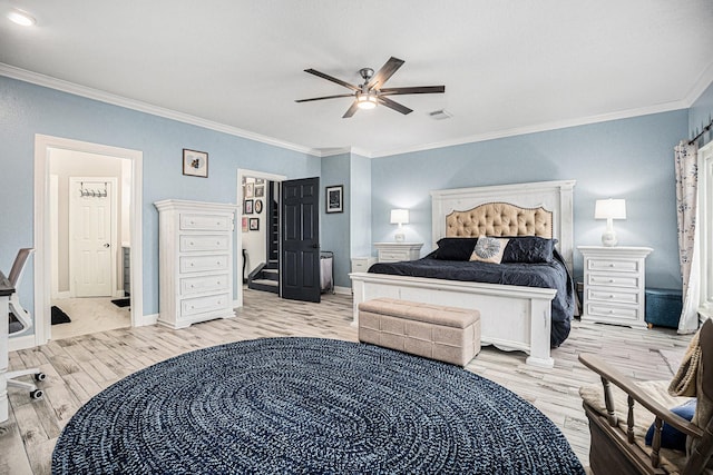 bedroom with light hardwood / wood-style flooring, ornamental molding, and ceiling fan