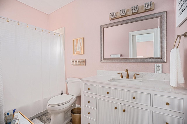 full bathroom with vanity, toilet, shower / tub combo, and wood-type flooring