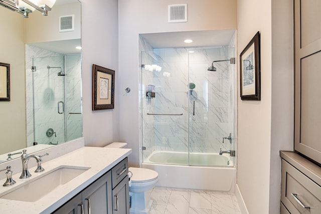 bathroom with toilet, marble finish floor, vanity, and visible vents