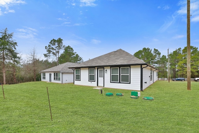 view of front facade with a front yard