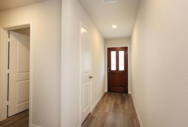 entryway with visible vents, recessed lighting, baseboards, and dark wood-style flooring