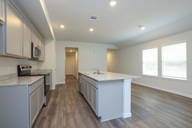 kitchen with a sink, stainless steel appliances, visible vents, and gray cabinets