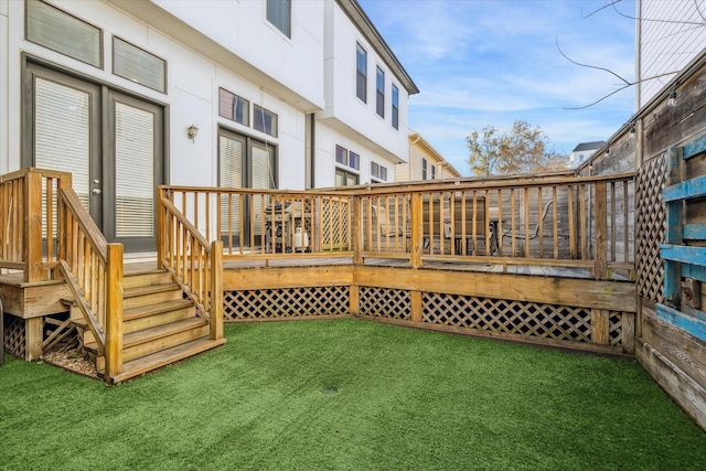 deck featuring a lawn