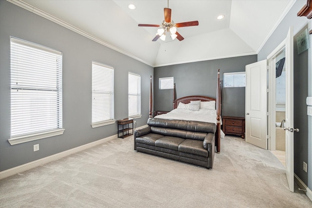 bedroom with crown molding, vaulted ceiling, and light carpet