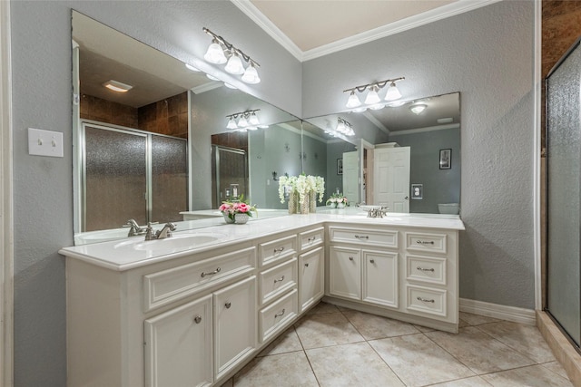 bathroom featuring ornamental molding, walk in shower, tile patterned floors, and vanity