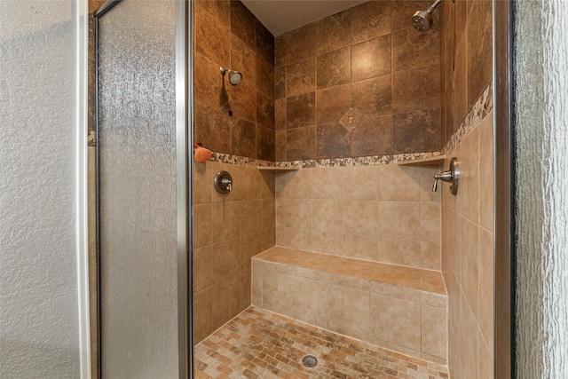 bathroom featuring walk in shower