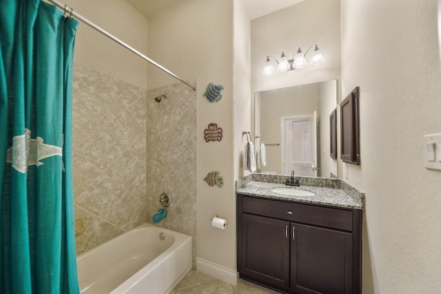 bathroom featuring vanity, tile patterned flooring, and shower / tub combo