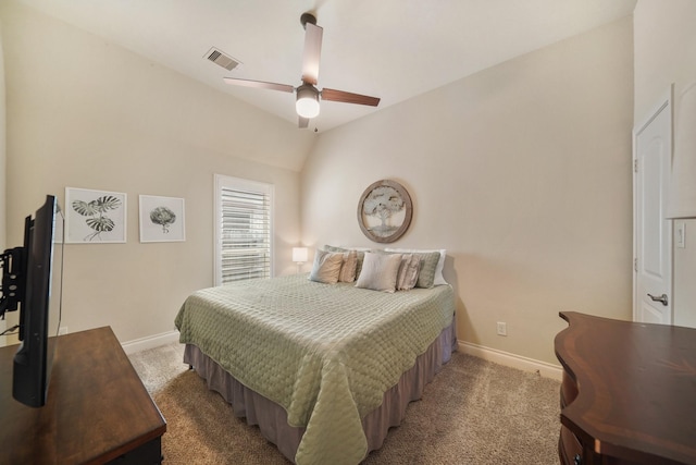 bedroom with carpet floors, ceiling fan, and vaulted ceiling