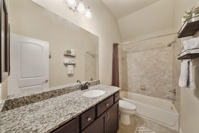 full bathroom with tile patterned floors, toilet, vaulted ceiling, shower / tub combo, and vanity