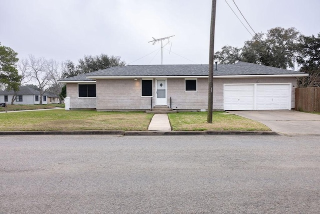 single story home with a garage and a front yard