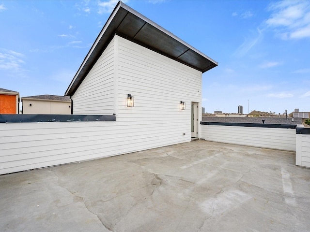 view of home's exterior with a patio area