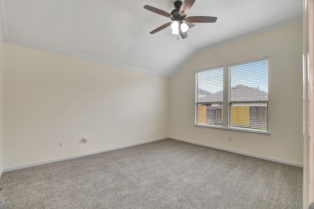 additional living space featuring ceiling fan, light colored carpet, and vaulted ceiling