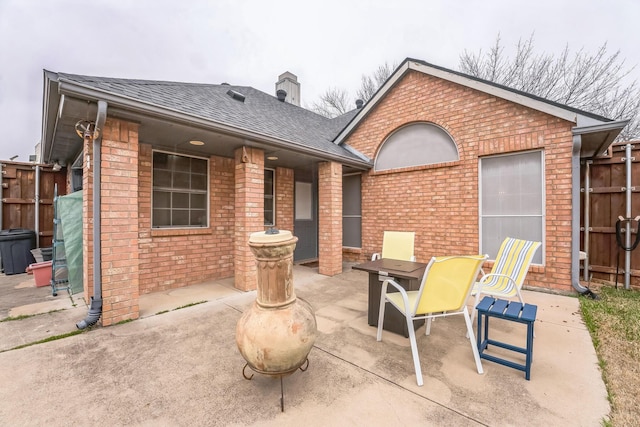 view of patio / terrace with a fire pit