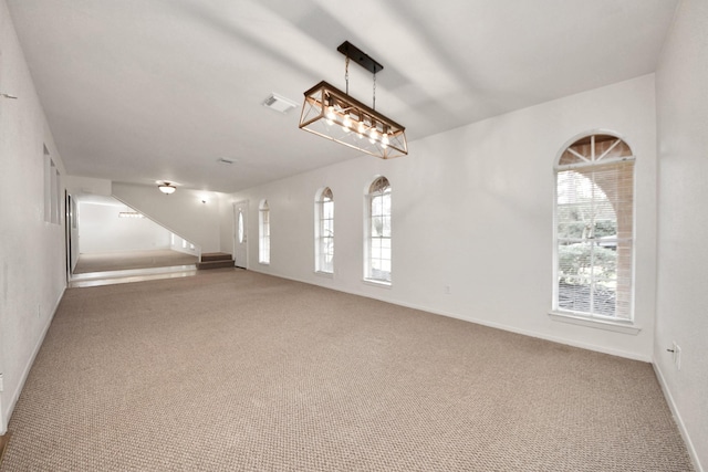 empty room with carpet flooring